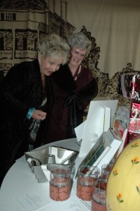 ladies inspecting the prizes at the tannenbaum ball